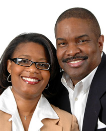 african-american couple in suits